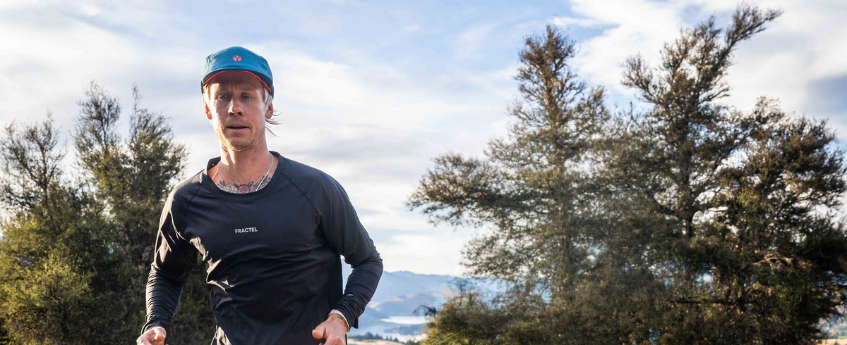 Liam McKenzie wearing a mens long sleeve running shirt