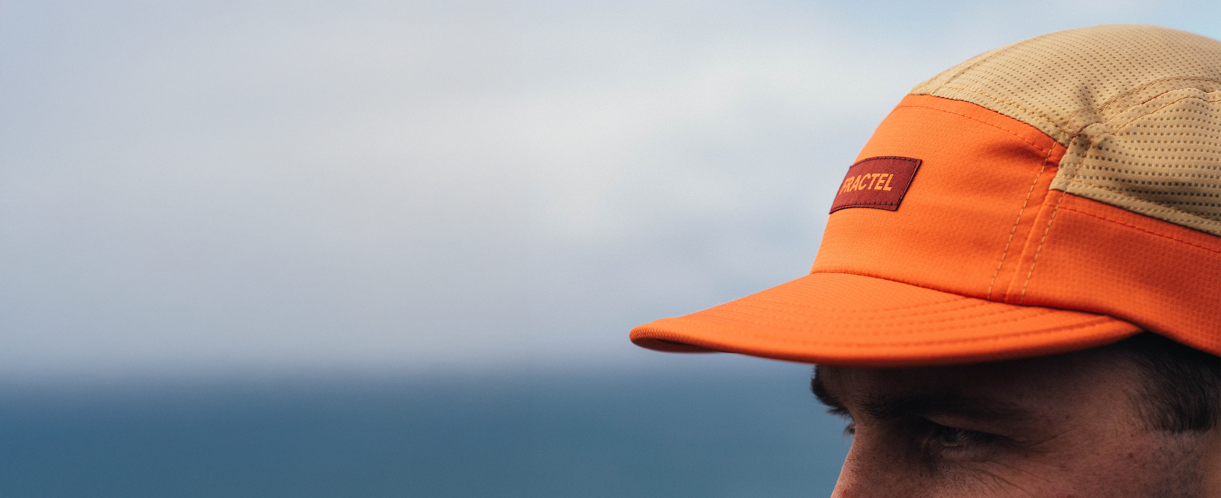 Fractel M-Series running cap banner
