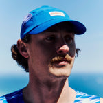 R-Series Performance Running Cap in Blue on Model