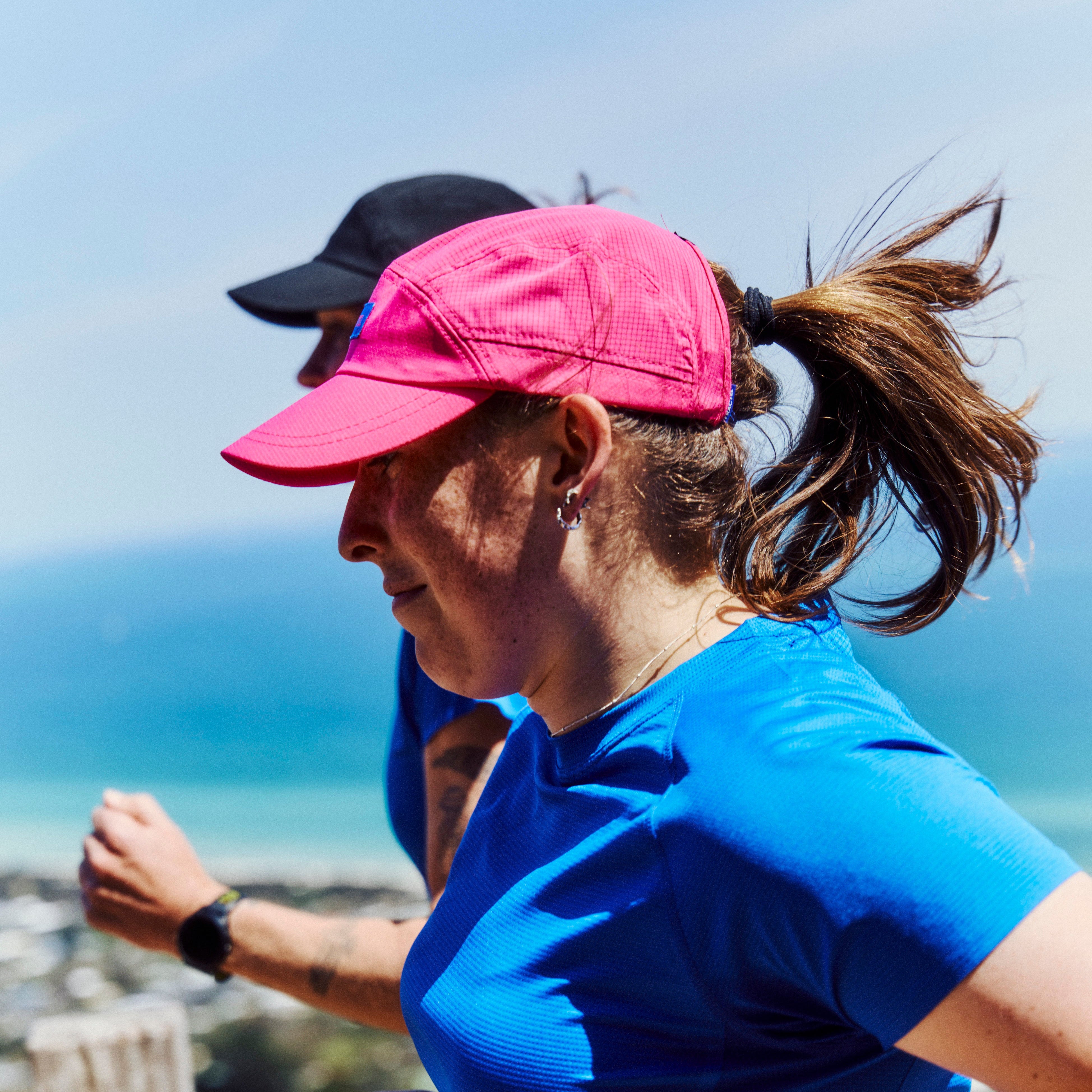 E-Series Performance Running Cap in Pink on Model