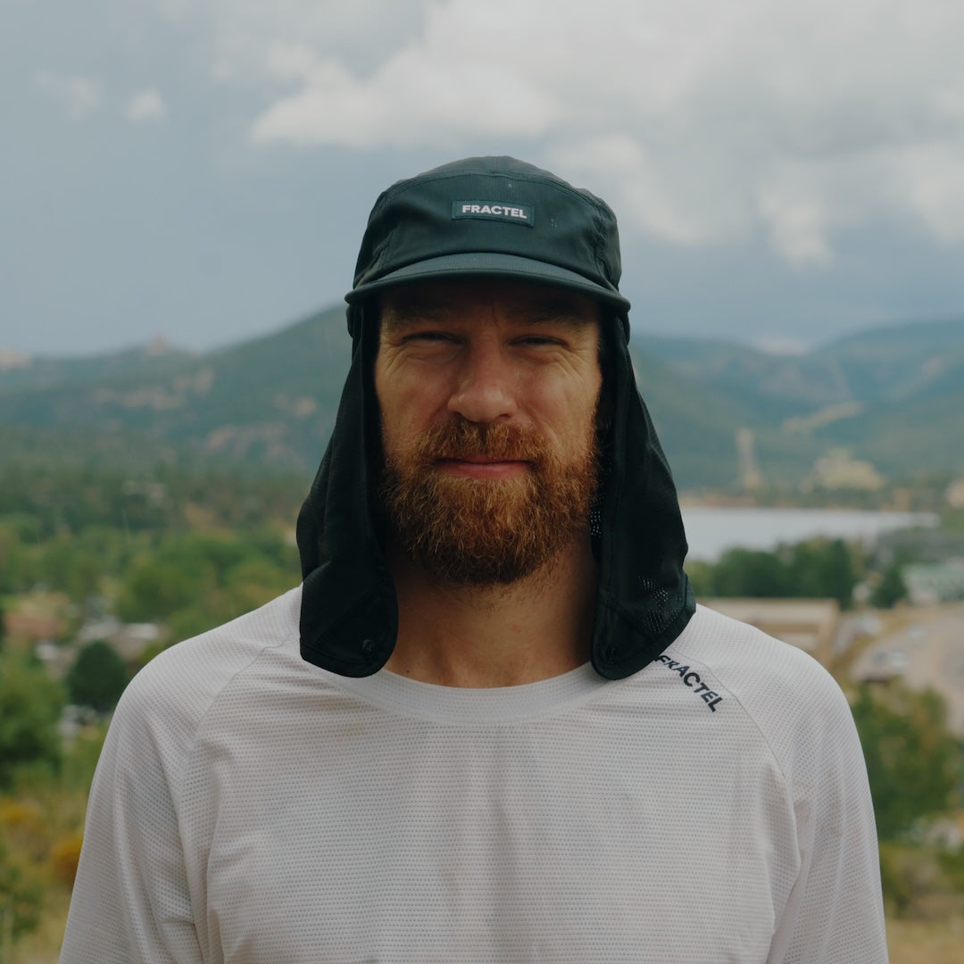 Runner wearing the Fractel L-JET Legionnaire Running Cap