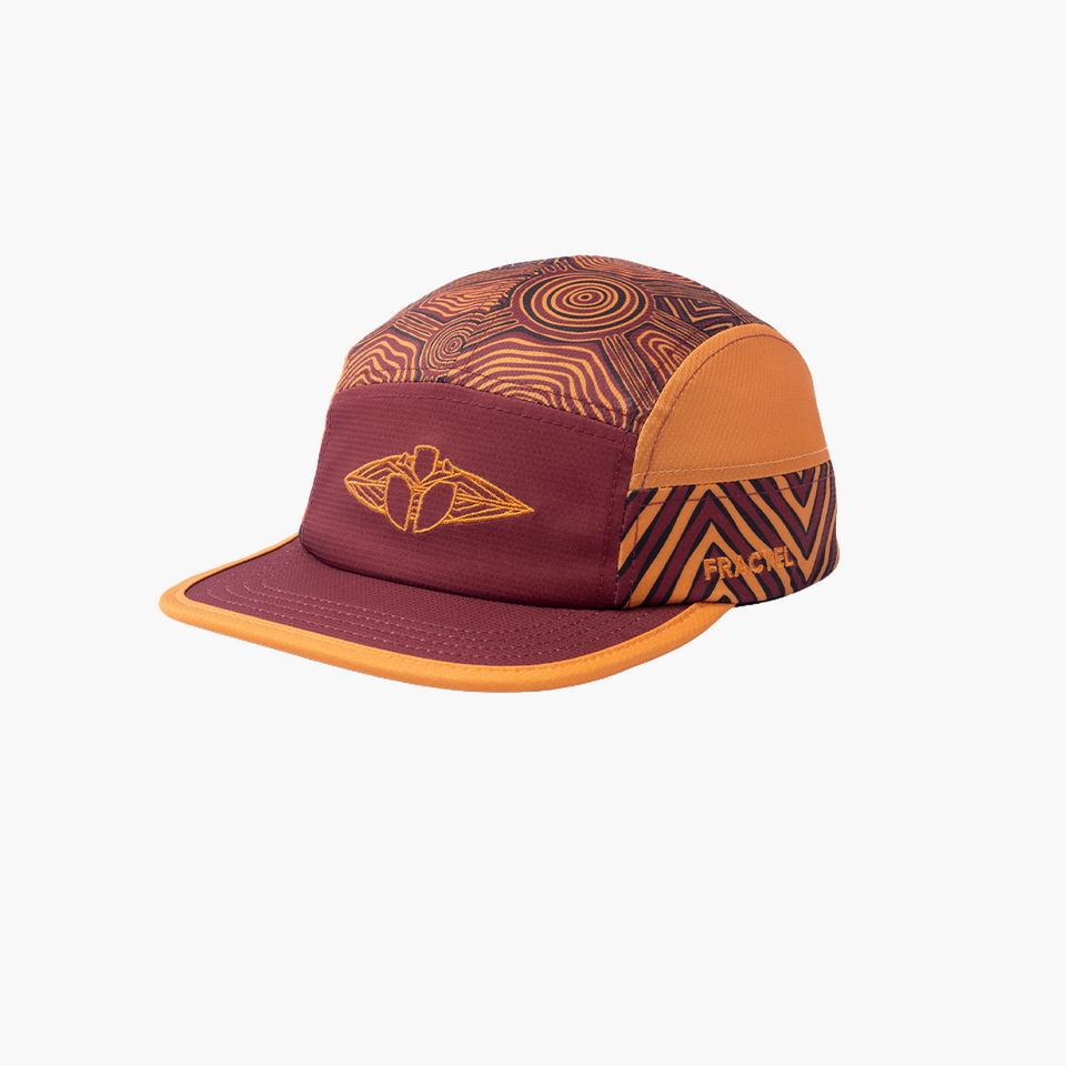 Fractel M-Ngurrumbaa Limited Edition Running Cap in orange, angled view