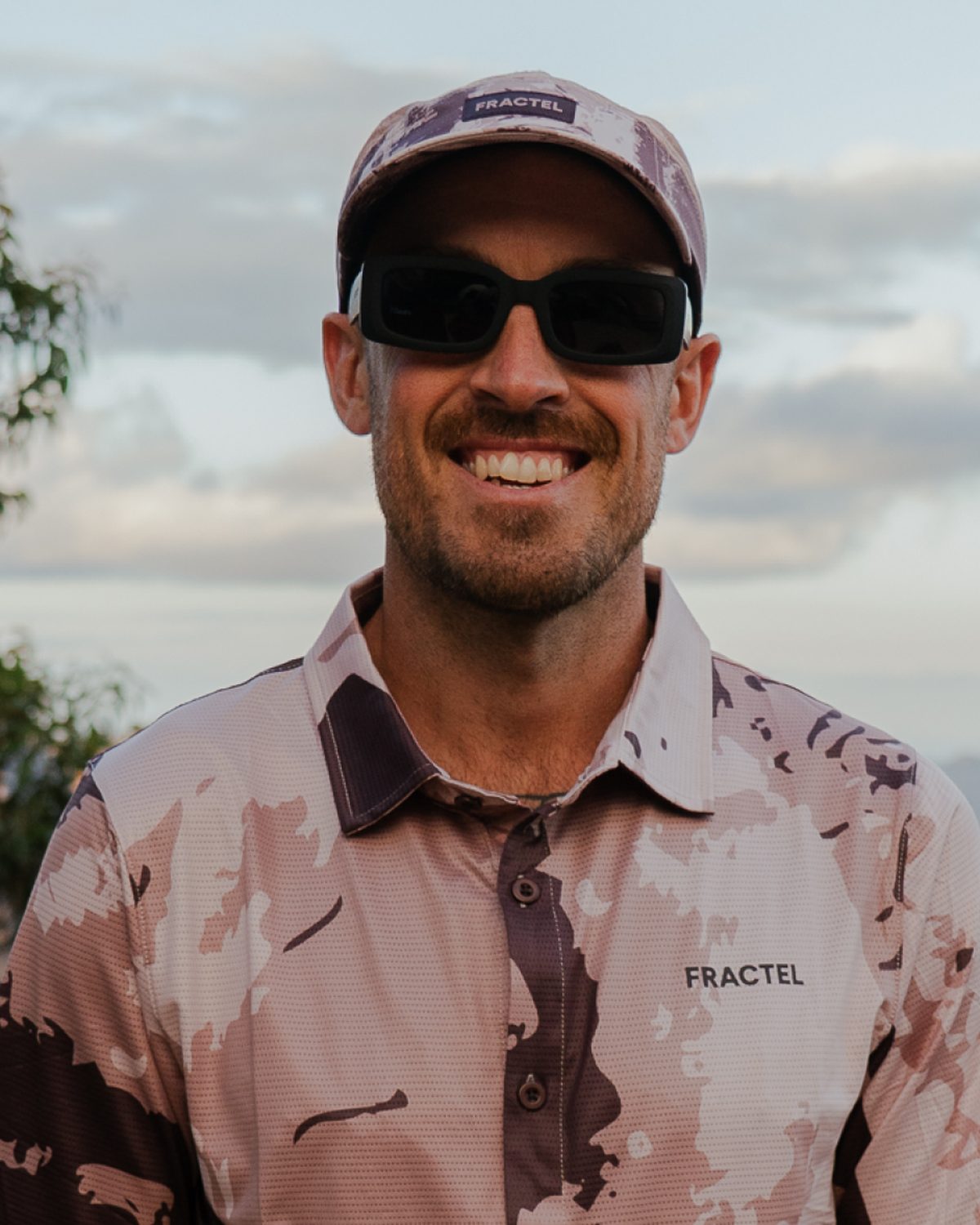Blue Mountains trail gear: Fractel collared shirt and cap worn at a lookout