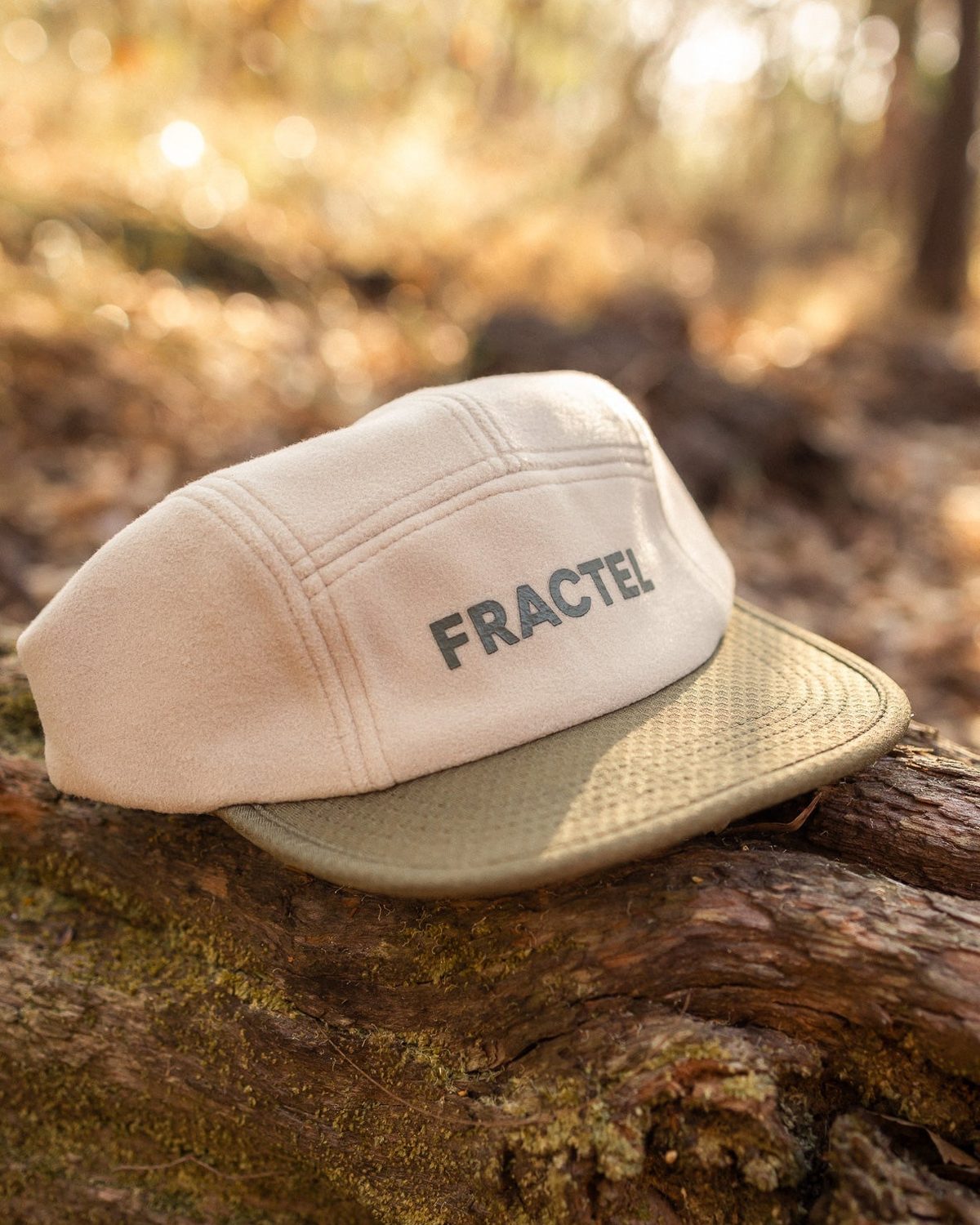 Polartec Wind Pro fleece cap in cream with a khaki brim